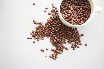 Mug of Coffee Beans Overflowing