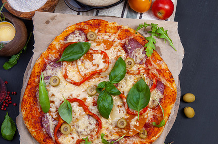 Delicious fresh pizza on dark