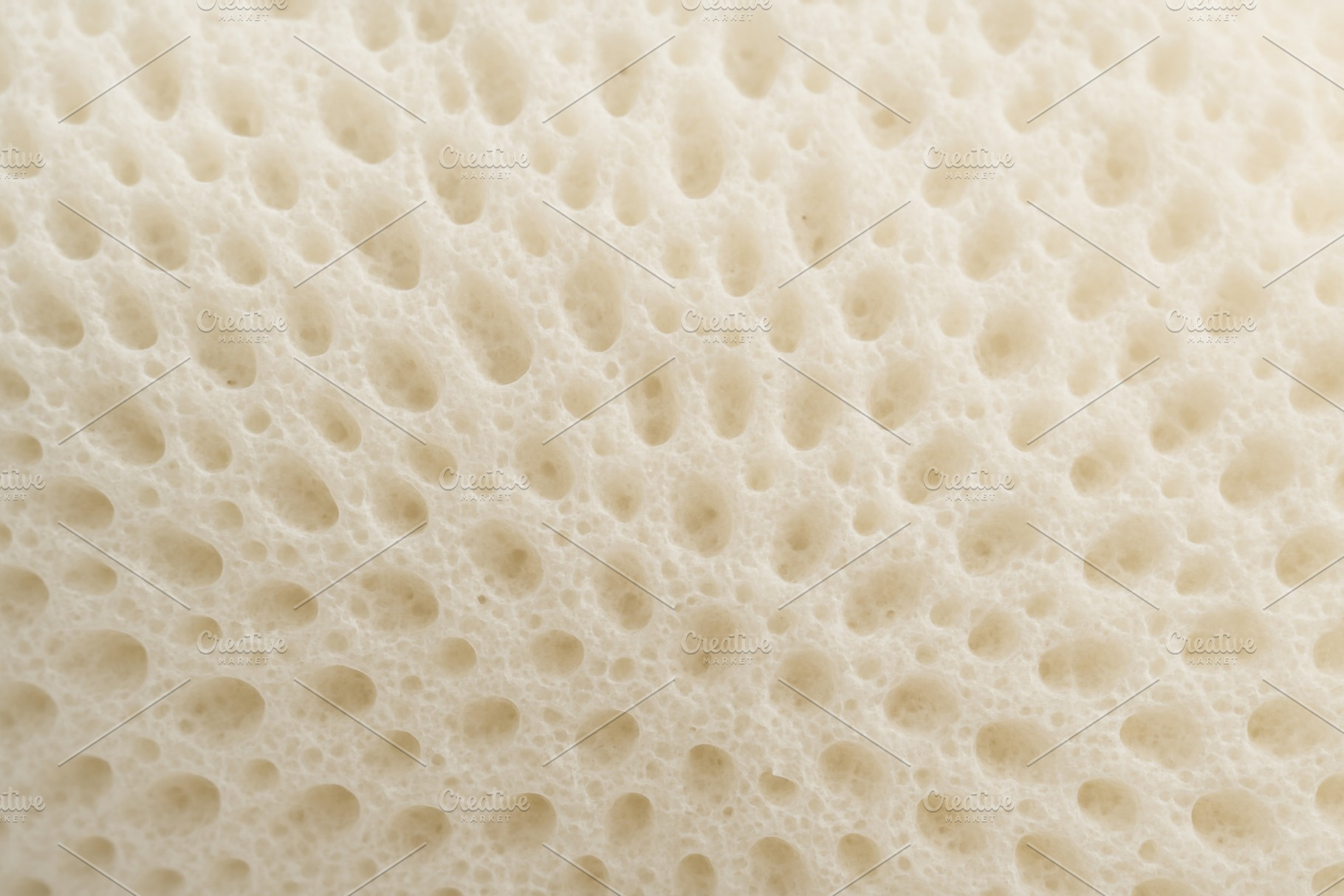 Close-up texture of beige sponge wit, a Photo by Dvoevnore photos