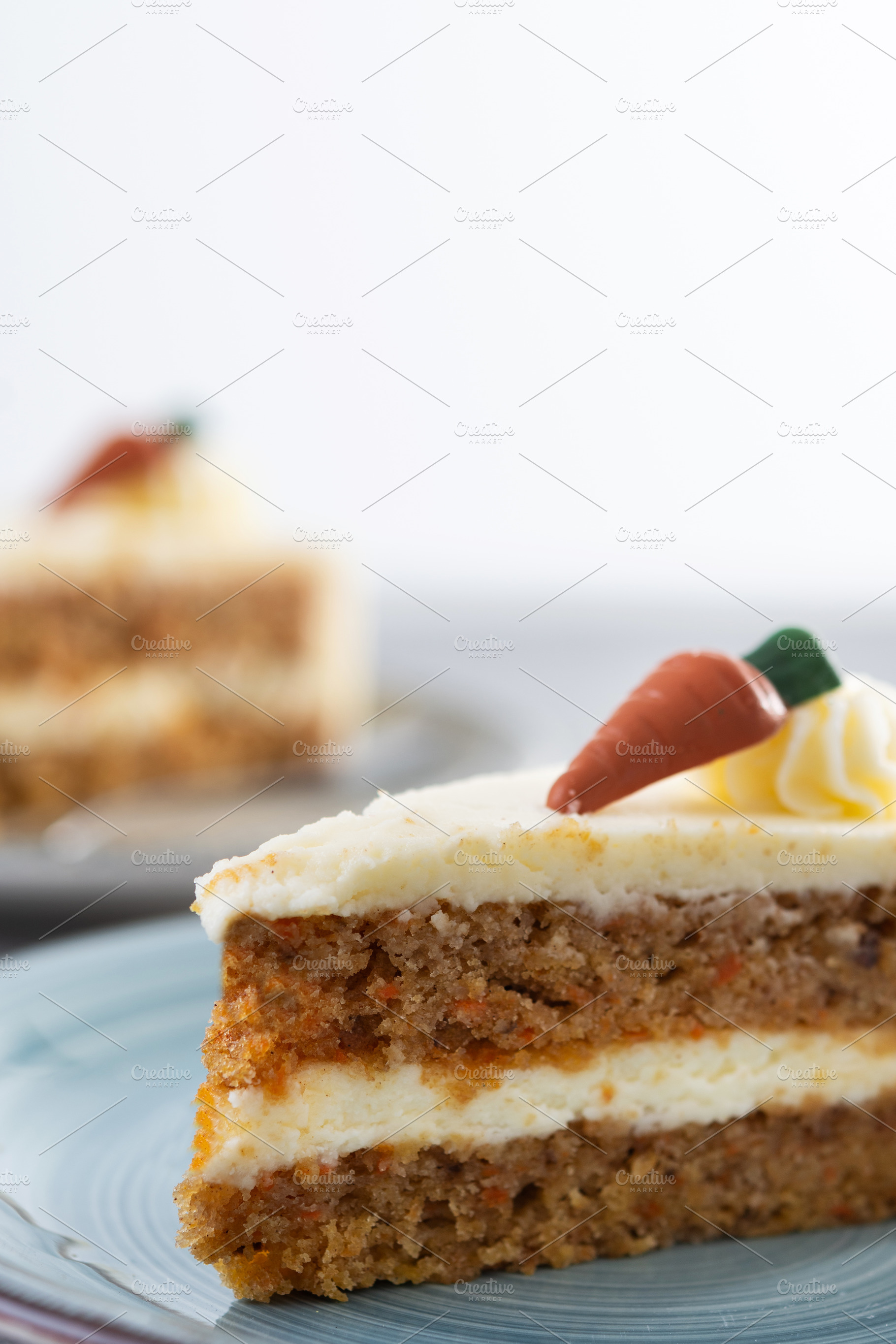 Carrot cake slice with cream cheese frosting, a Food & Drink Photo by etorres69