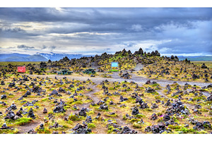 Laufscalavarda a lava ridge surrounded by stone cairns iceland featuring, a Nature Photo by Leonid Andronov