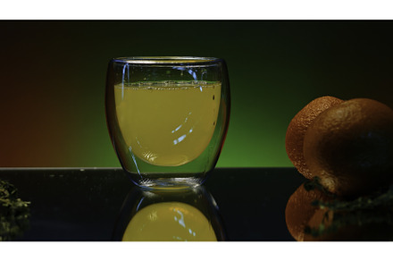 A glass with alcoholic cocktail, a Person Photo by Media Whale Stock