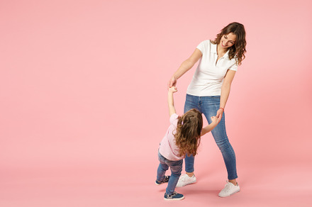 Woman in light clothes have fun with stock photo containing baby and casual
