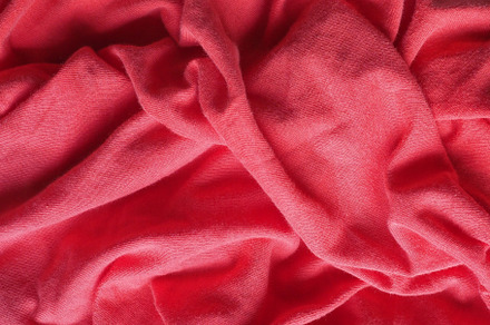 crumpled red fabric texture background, a Background Photo by WorldPhotos