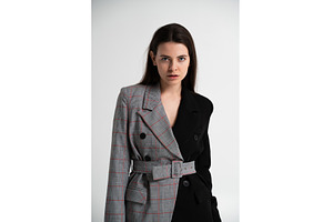 Young woman posing in studio wearing, a Business Photo by volodymyrshtun13795