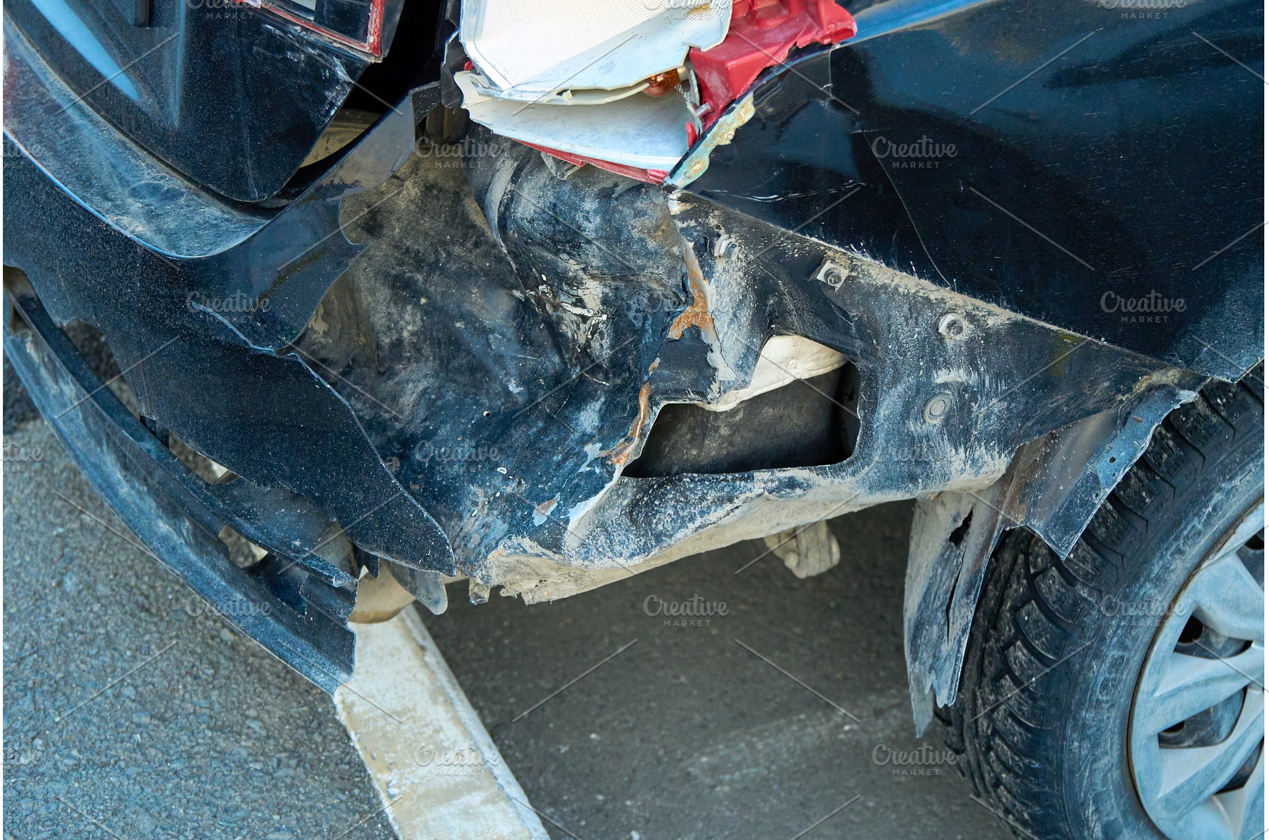 A car rear bumper shows signs of, a Transportation Photo by darksoul72
