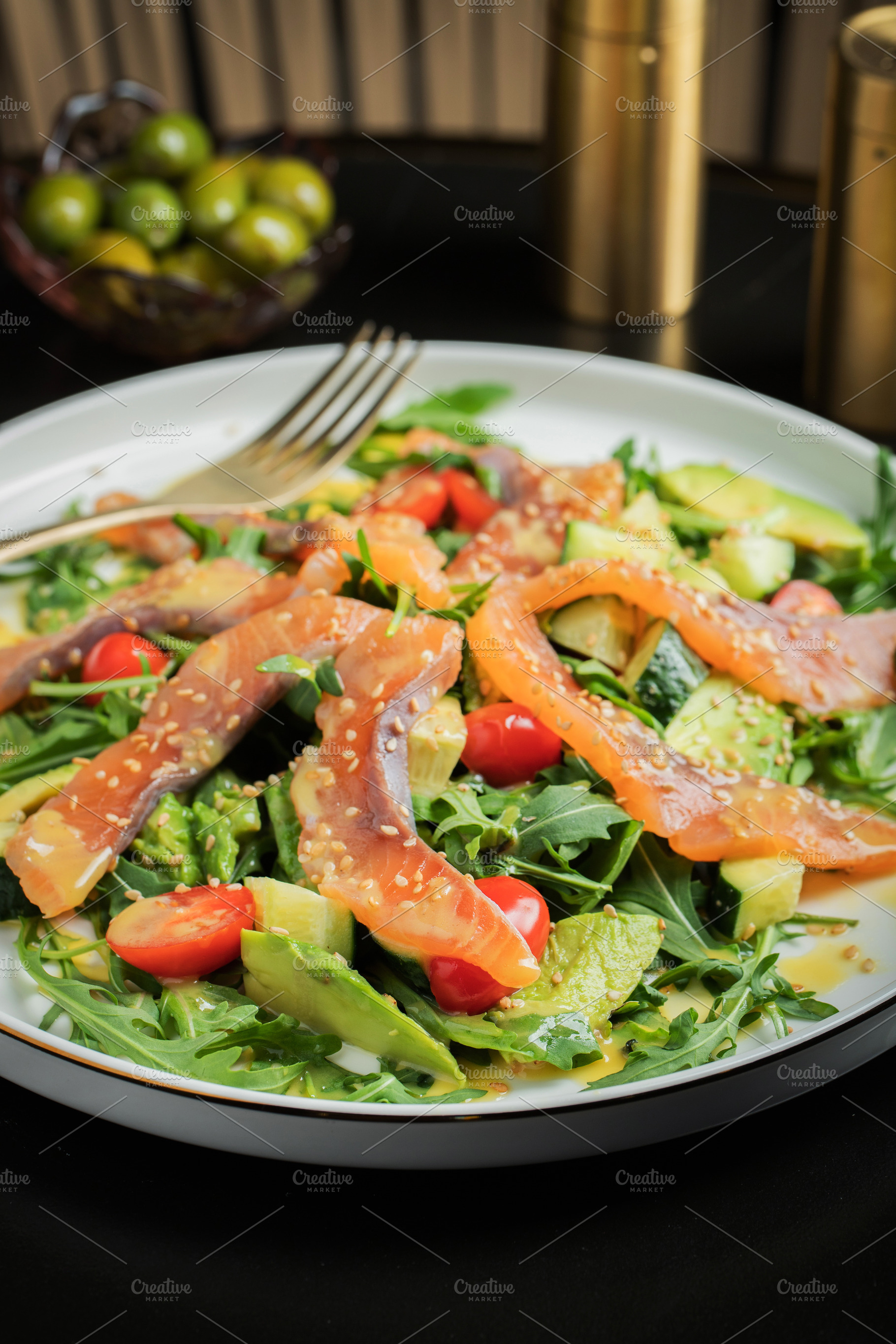 Salad with salted salmon and arugula, a Food & Drink Photo by Budarinphoto