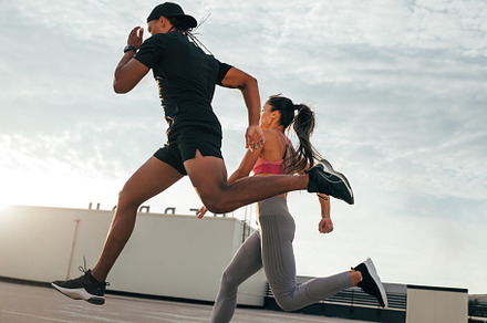 Fitness couple running and jumping, a Sports & Recreation Photo by Artem Varnitsin
