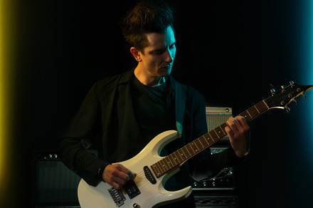 Electric guitar player, a Person Photo by Elena Vagengeim