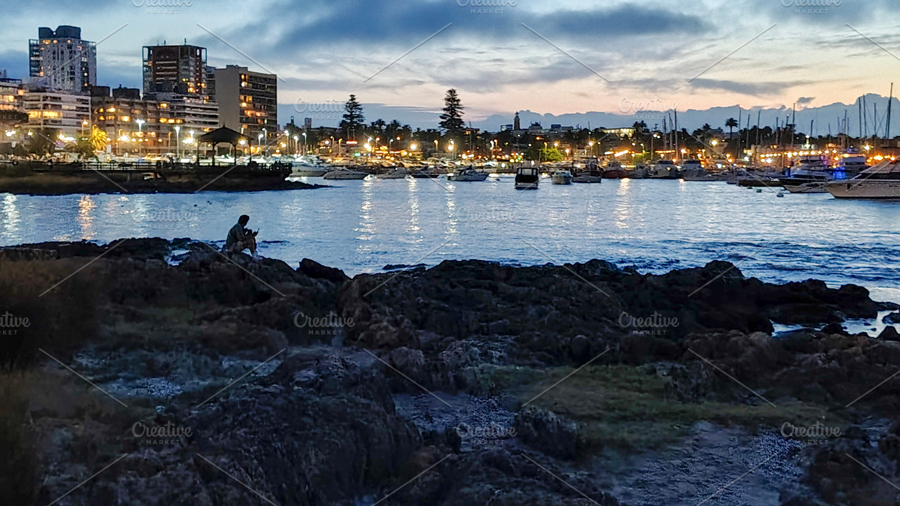 Rocky border and port at background, punta del este city, urugua, a Sports & Recreation Photo by DanFLCreativo