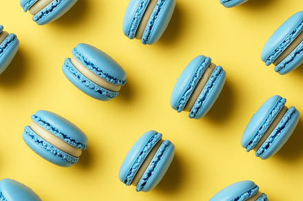 Blue macaroons on bright yellow, a Food & Drink Photo by MistyDay