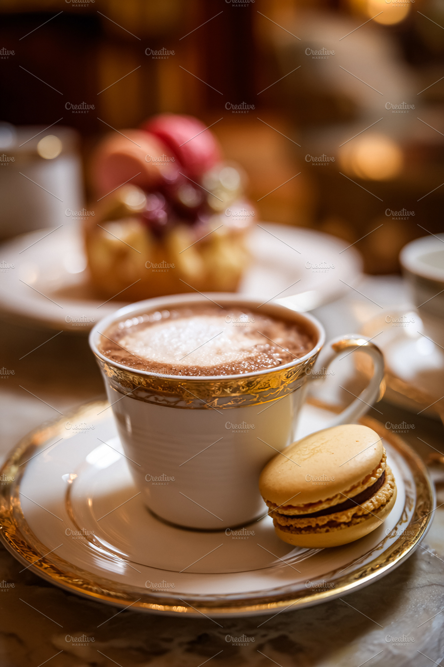 Gourmet hot beverage with macaron on elegant tableware, enjoying, a Food & Drink Photo by Studio ANNA