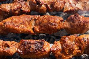 Grilled pork shish kebab cooking, a Food & Drink Photo by Alexander-Piragis