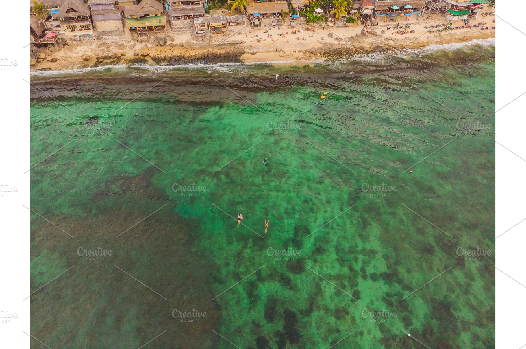 Surfers on the waves in the ocean, a Sports & Recreation Photo by Elizaveta Galitskaya