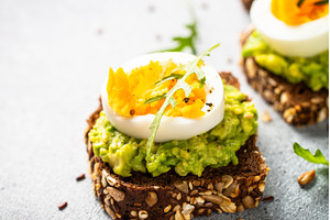 Whole grain bread with avocado and, a Food & Drink Photo by Nadia-nb