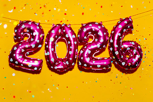 pink balloons show number 2026, as the new year, a Photo by Nito