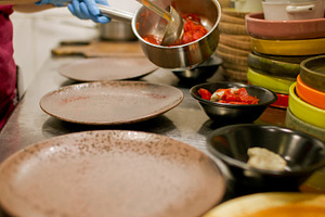 Ladling food portioned dish pouring meal bowl chef, a Food & Drink Photo by Photo Drive Studio