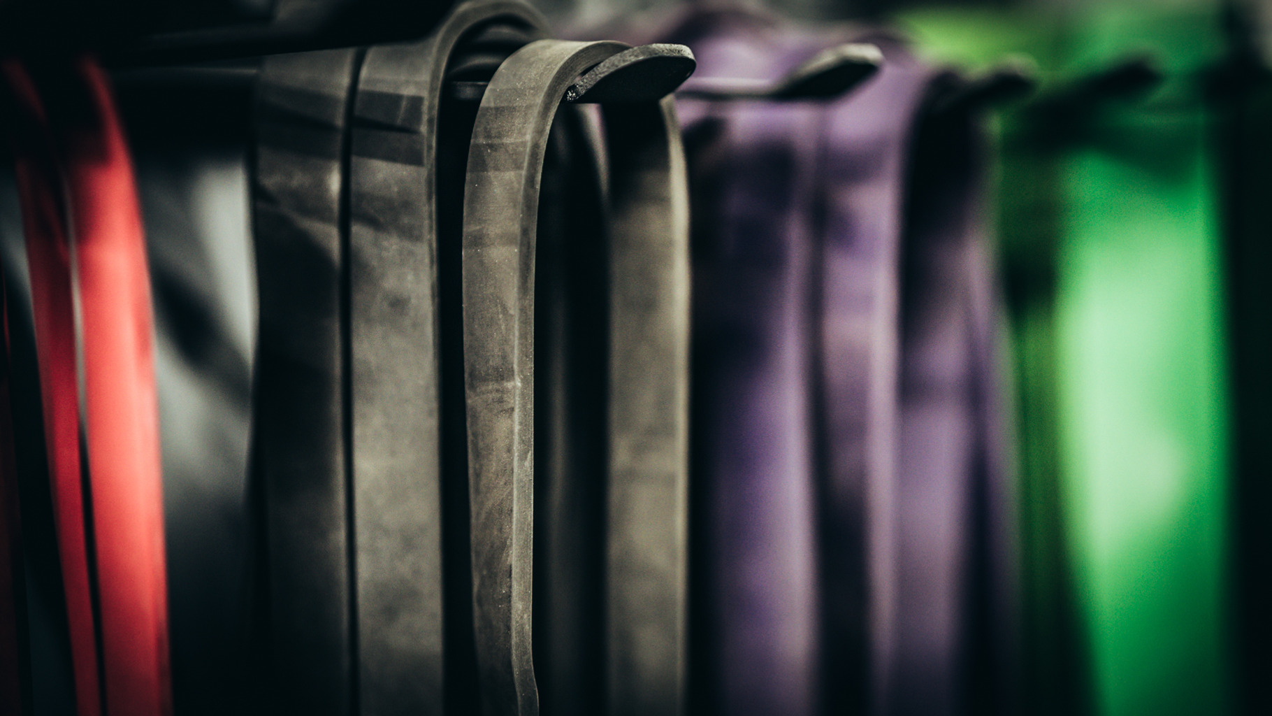Resistance Bands On A Rack At Gym, a Photo by Snake Eye Media