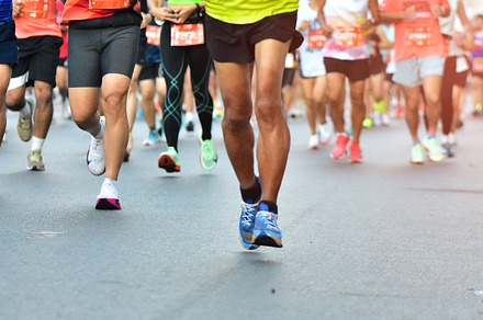 People Running On City Road.