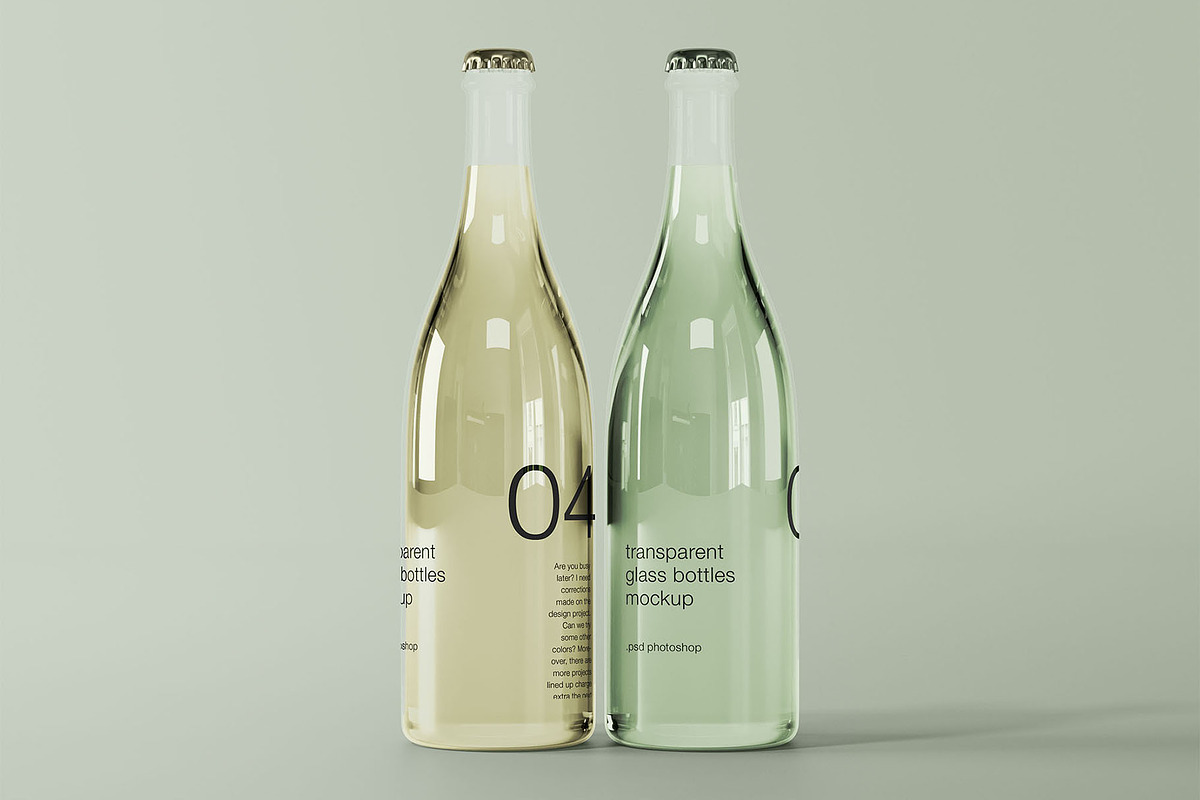 Two Transparent Glass Bottles Mockup, a Packaging Mockup by Graphic Pear (Photo 1 of 2)
