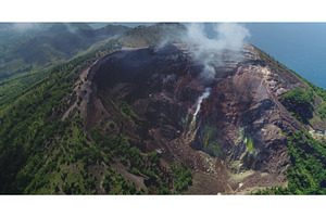Aerial view of smoke rising from, a Nature Photo by Goinyk