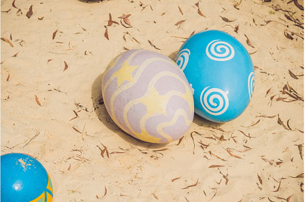 Multicolored eggs in the grass, a Holiday Photo by Elizaveta Galitskaya