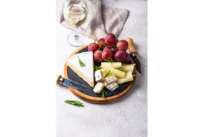 Different types of cheese, wine and, a Food & Drink Photo by Yulia Furman
