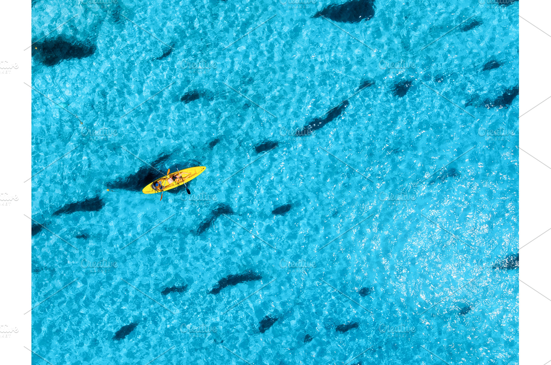 Aerial view of a kayakers paddling, a Nature Photo by den-belitsky