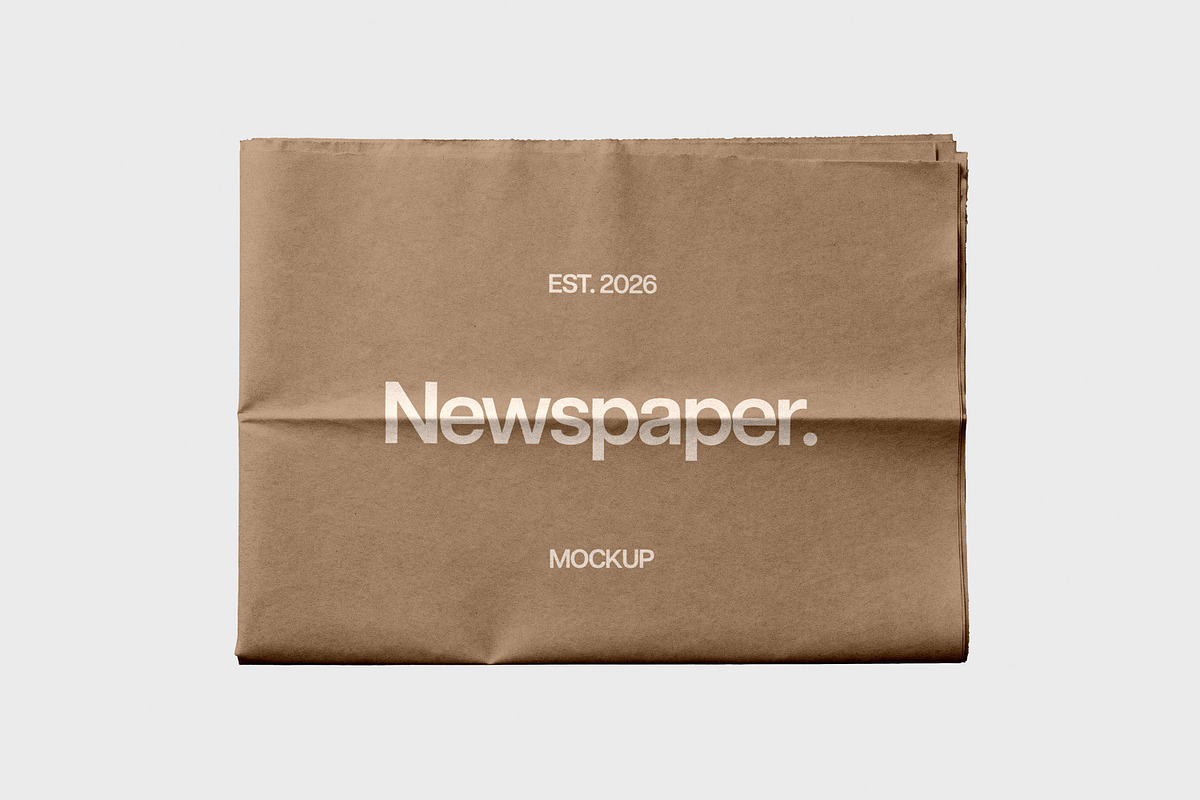 Newspaper Mockup, a Books & Magazine Mockup by Design Squad (Photo 2 of 5)