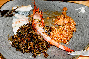 mixed rice with shrimp and fish on plate, a Photo by Nito
