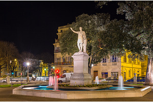 Statue of Antonin, a Roman emperor, in Nimes, France, an Architecture Photo by Leonid Andronov