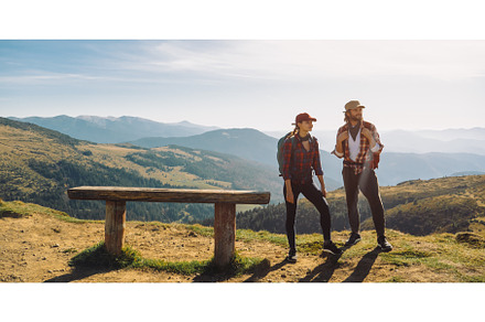 Couple of Hikers With Backpacks in