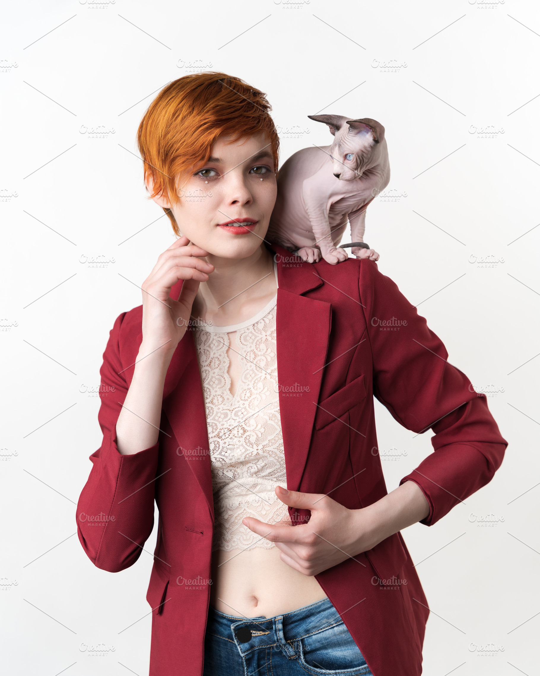 Portrait of woman and playful cat, a Person Photo by Alexander-Piragis