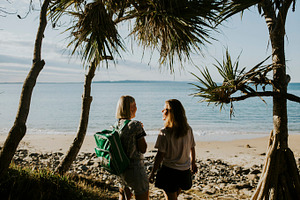 Girls exploring beach