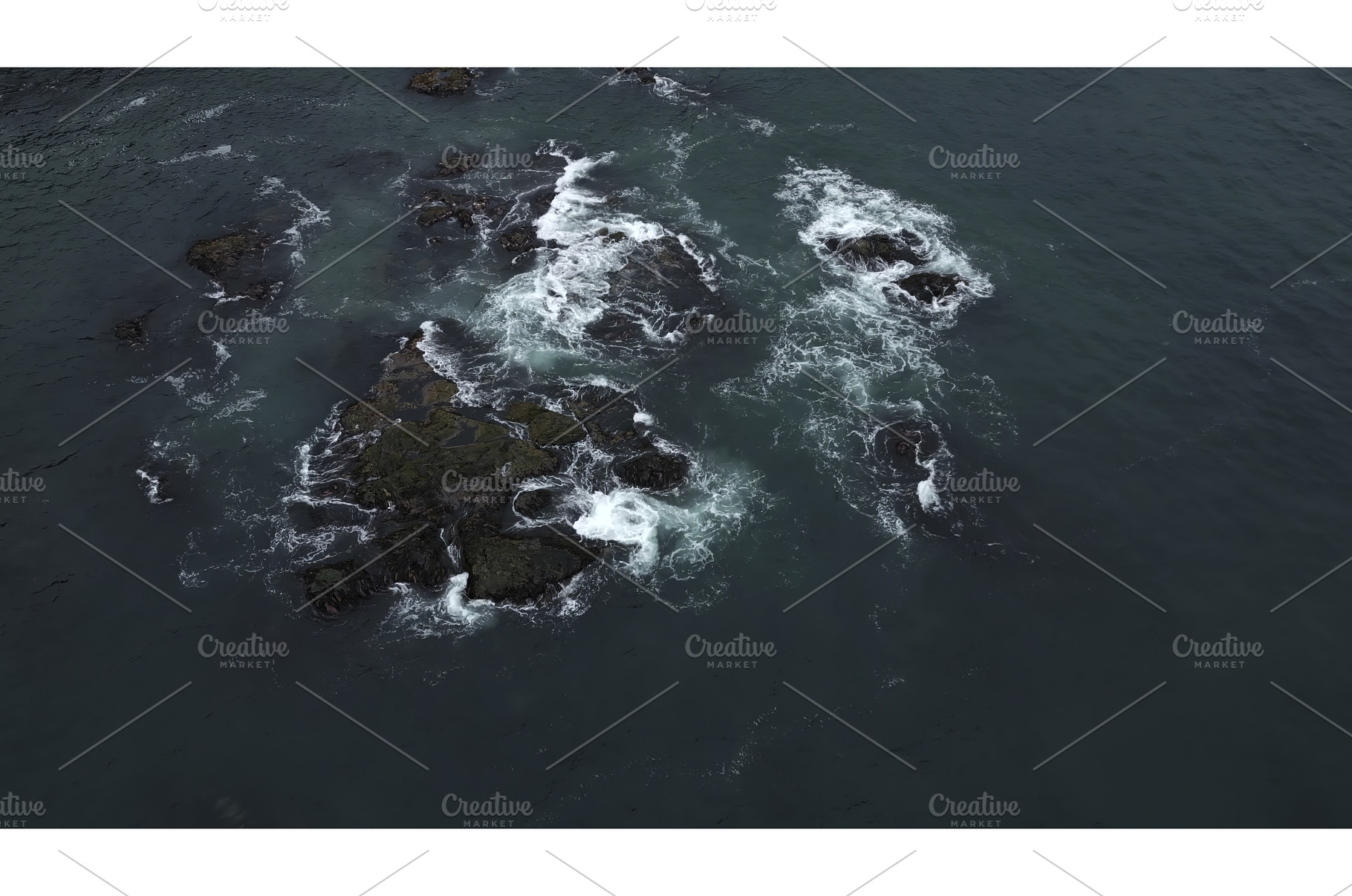 Top view of rocky reef near ocean, a Nature Photo by Media Whale Stock