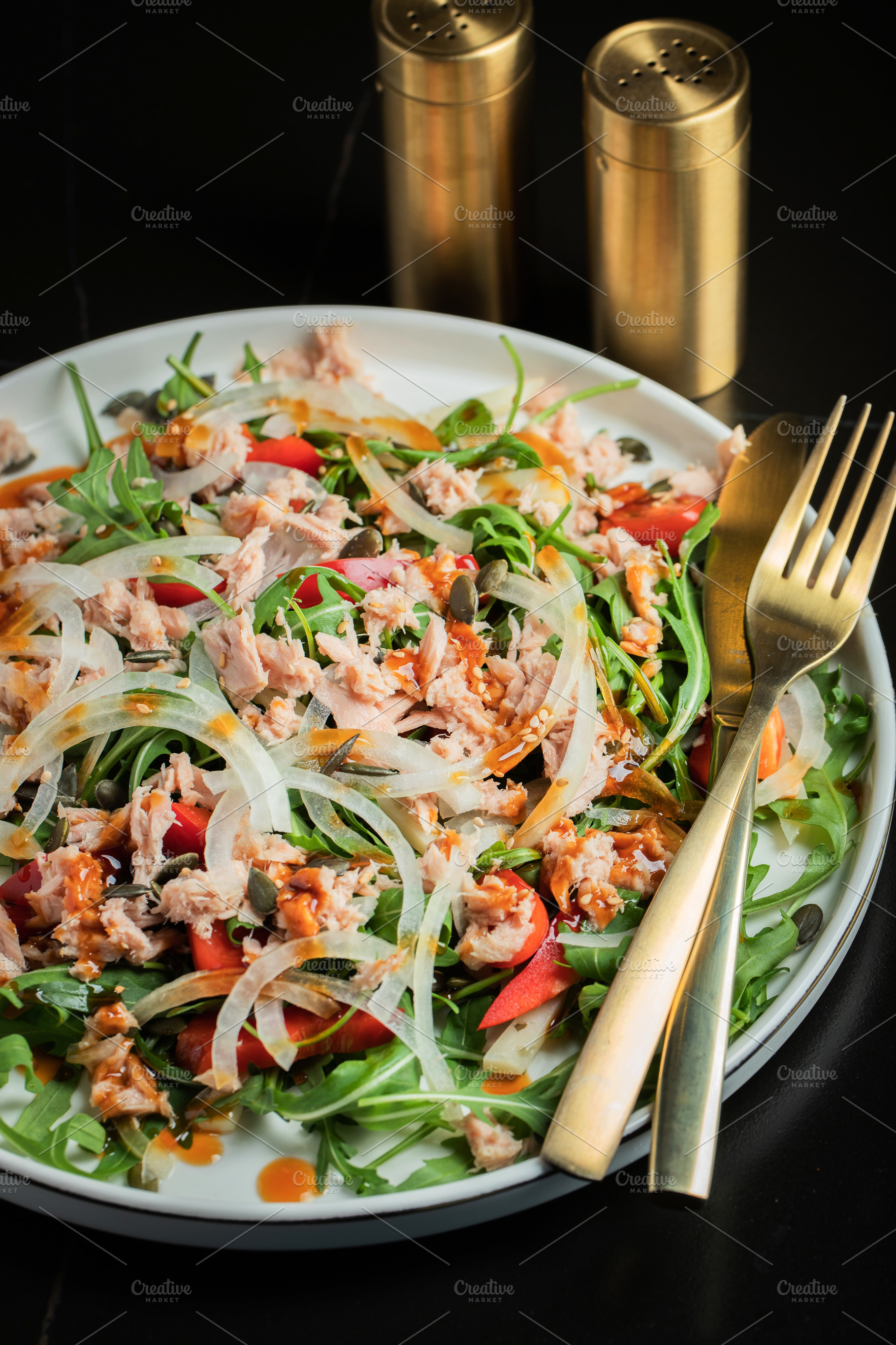 Fresh Tuna Salad with Onions and Cherry Tomatoes. Italian Mediterranean Cuisine, a Food & Drink Photo by Budarinphoto