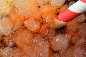 Macro of a refreshing drink with ice and a straw, a Food & Drink Photo by Davizro's Market