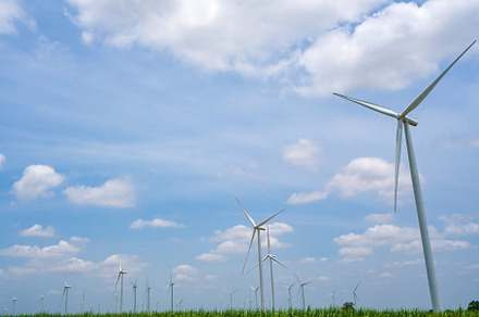 Wind turbine renewable energy source summer with blue sky, an Industrial Photo by Casanowe-studio