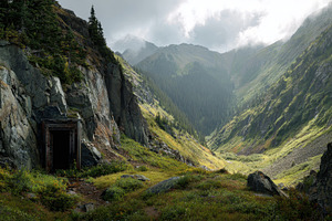 A vast mountain valley unfolds, a Photo by Pavel_design