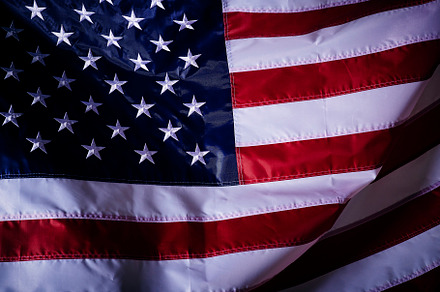 closeup shot of the waving flag of the United States of America, a Photo by 1981 Rustic studio kan