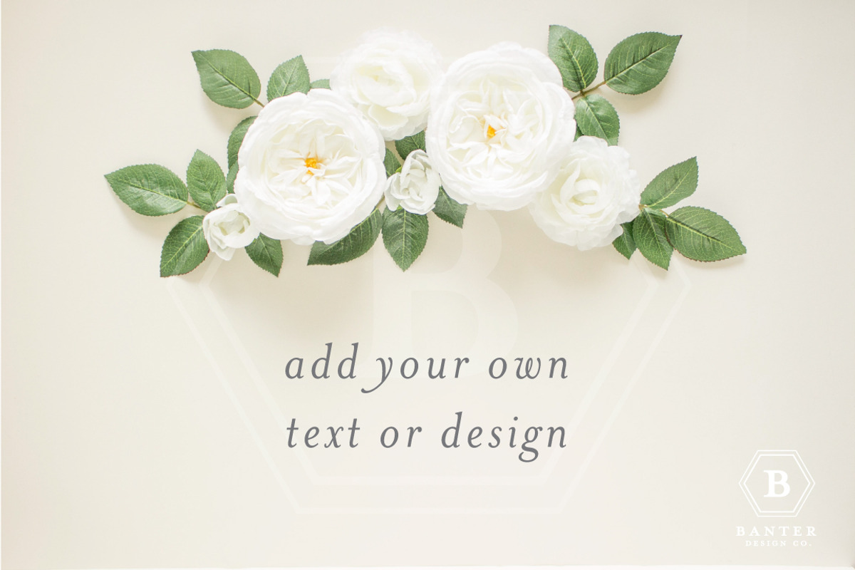 Flat Lay Photo with White Flowers, a Product Mockup by Banter Design Co. (Photo 2 of 2)