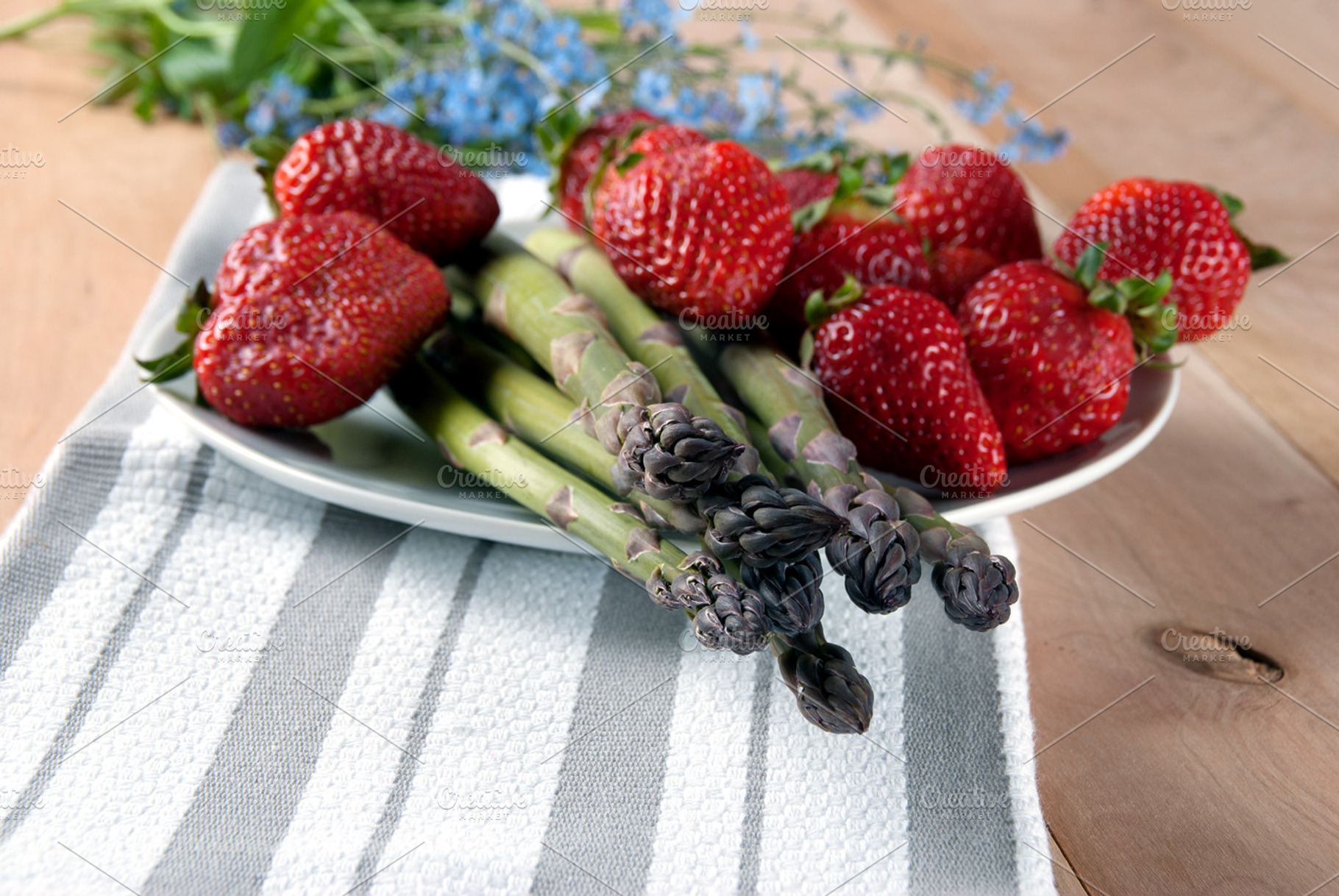 Fresh asparagus with strawberries containing asparagus, bunch, and crispy, a Food & Drink Photo by Bloor