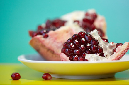 Natural antioxidant, healthy pomegranate seeds. Close up of raw red ripe pomegr, a Food & Drink Photo by Rohan Photography