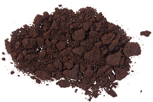 Pile of dark brown finely ground coffee, top view. Coffee is sca, a Food & Drink Photo by ndanko