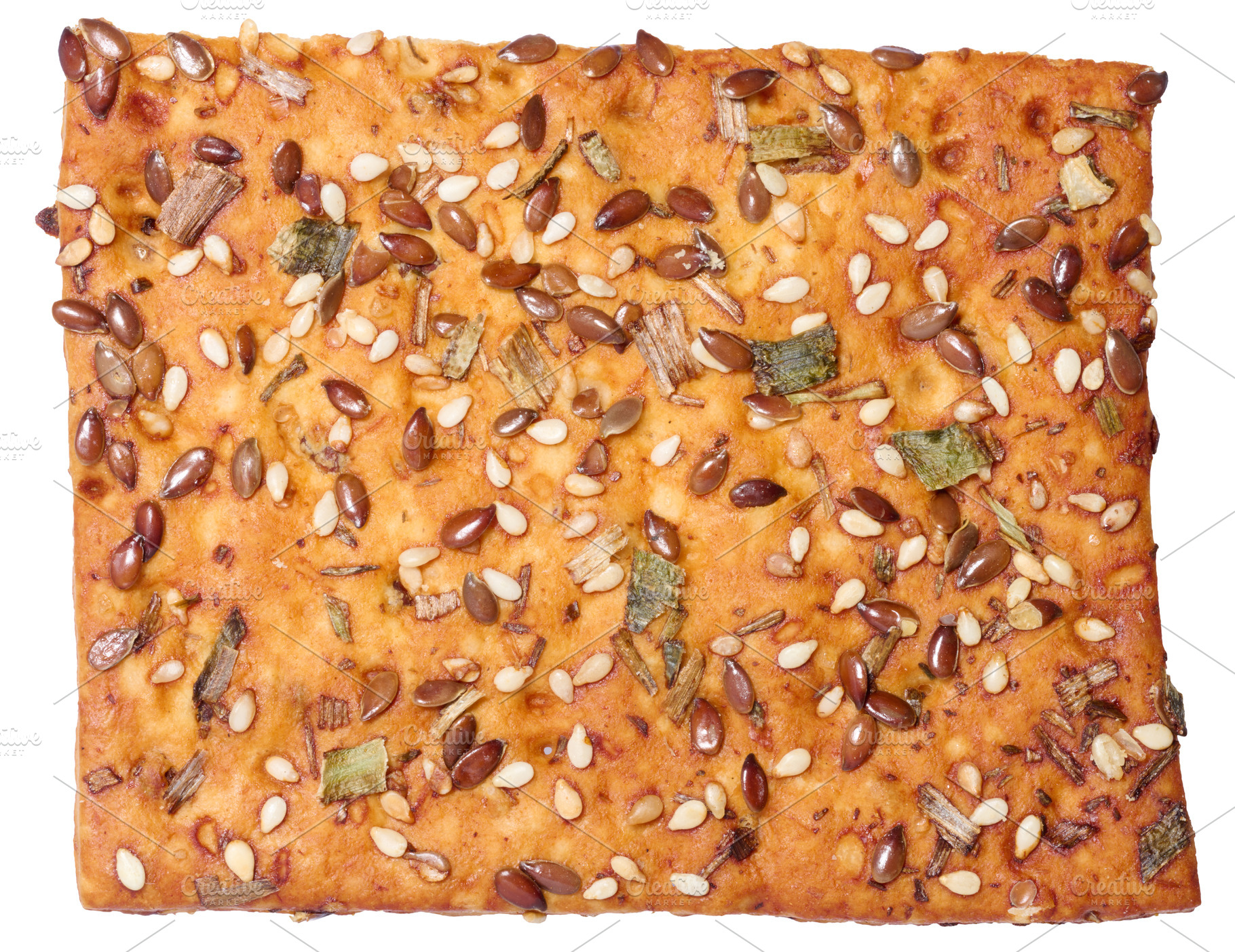 Crispy bread sprinkled with flax and sesame seeds, dried herbs,, a Food & Drink Photo by ndanko