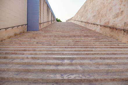 Modern stone staircase going up, an Architecture Photo by Photostock