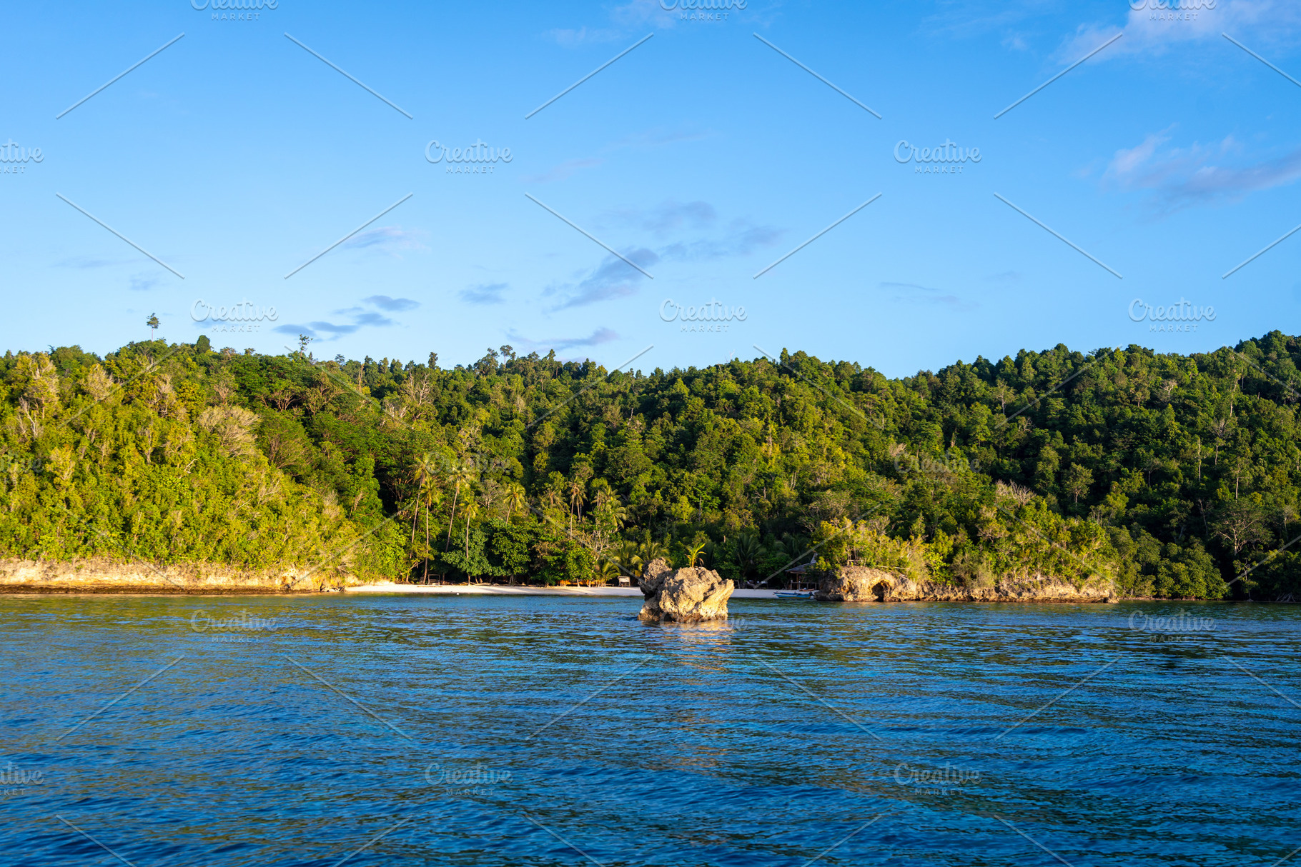 Lia beach at sunset, Waleakodi Island, Togian archipelago, Sulaw, a Nature Photo by GoodGoods