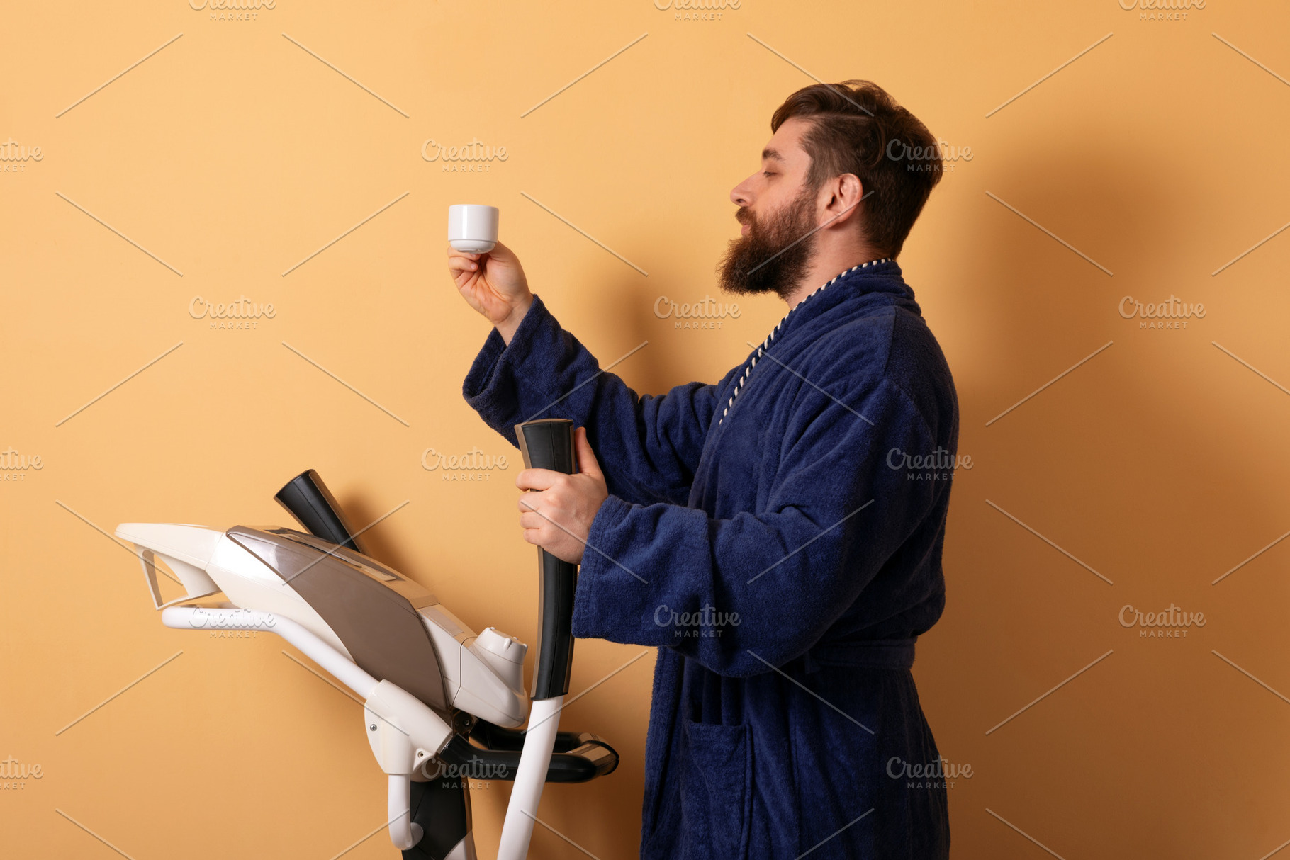 Man Drinking Coffee on Treadmill, a Person Photo by Ales Munt