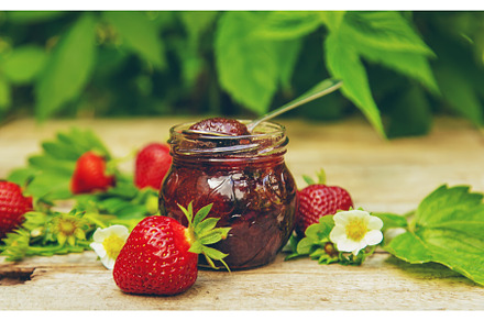 Homemade strawberry jam in a jar, a Food & Drink Photo by yanadjana