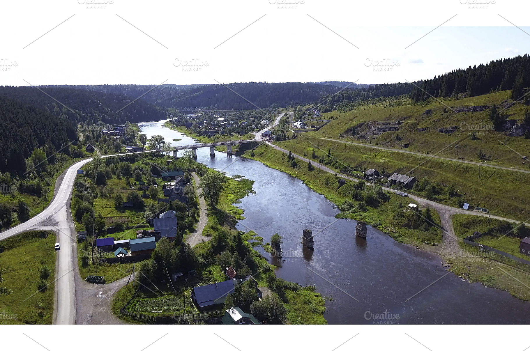 Top view of village and old bridge, a Nature Photo by Media Whale Stock